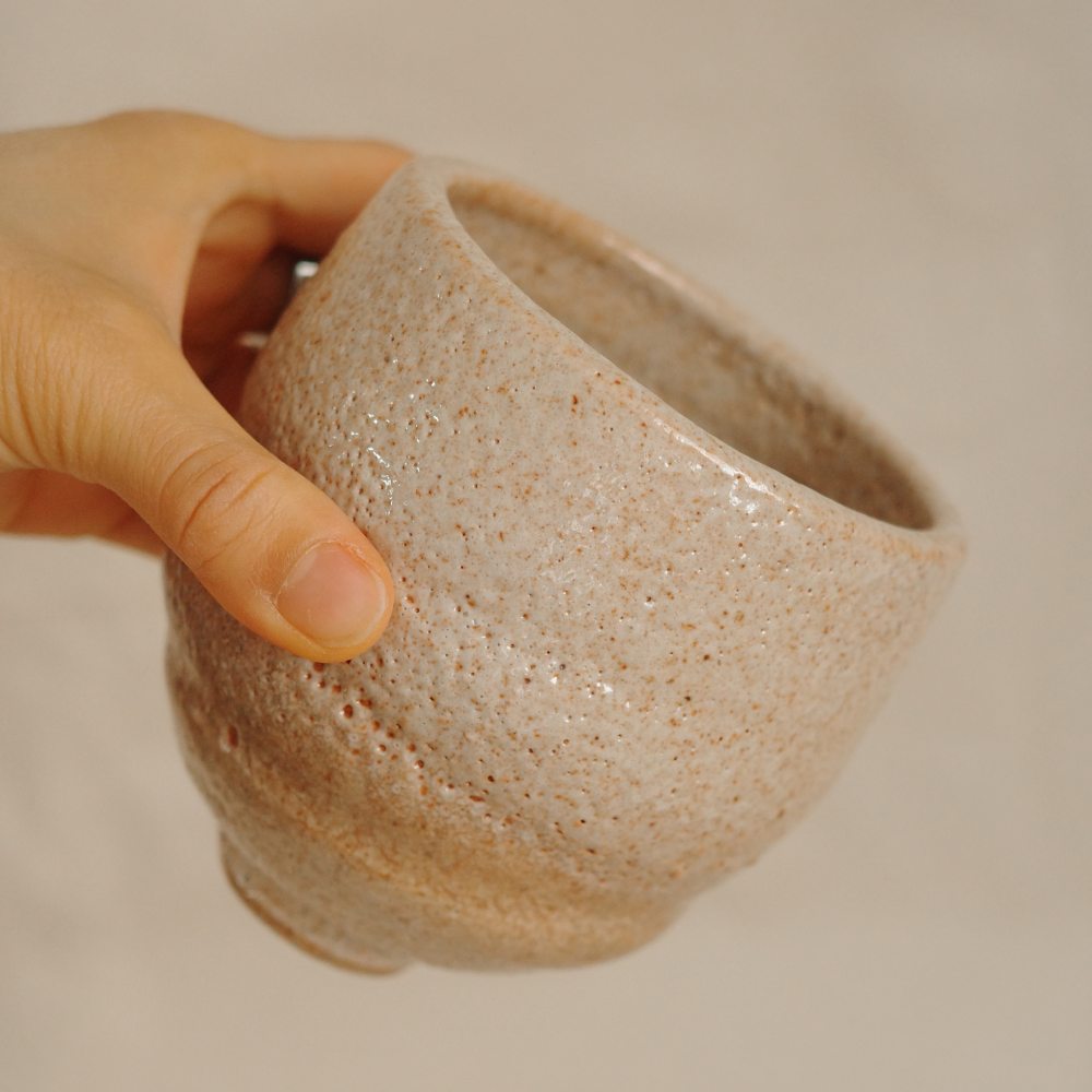 Asymmetrical gently toasted crawly cup