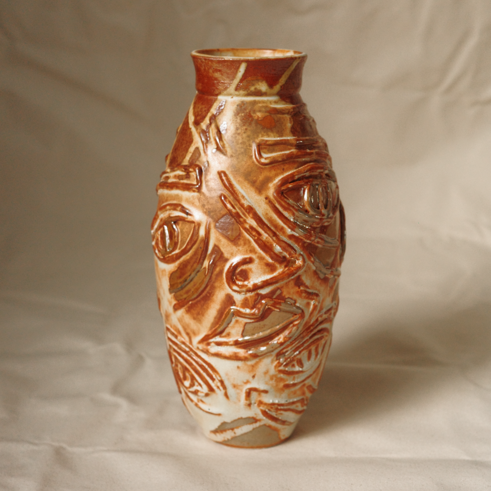 Creepy face vase