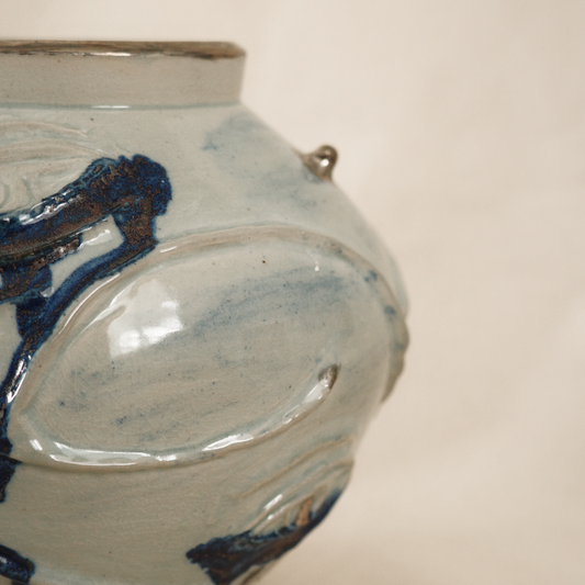 Creepy moon jar with eyeballs