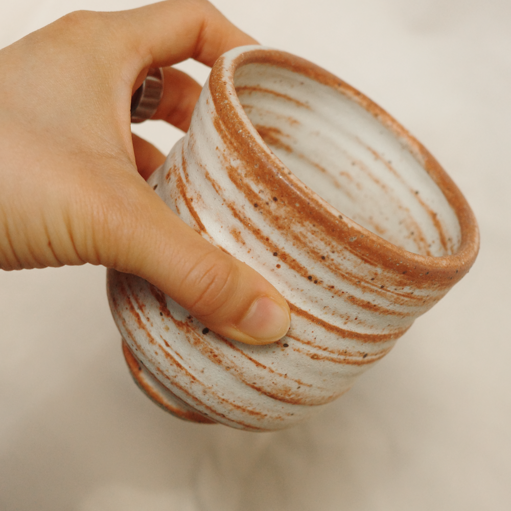 Asymmetrical gently toasted cup