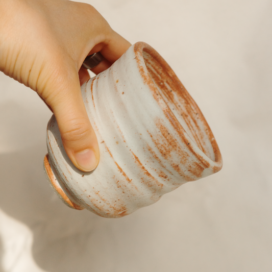 Asymmetrical gently toasted cup