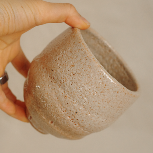 Asymmetrical gently toasted crawly cup