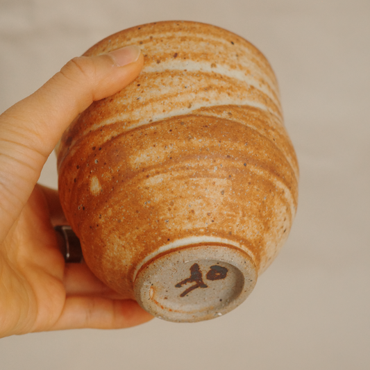 Asymmetrical toasted cup