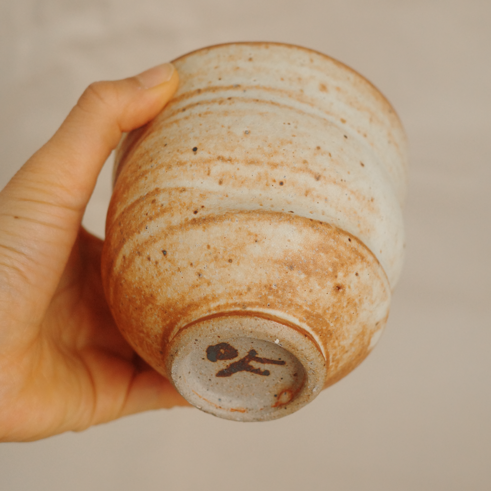 Asymmetrical toasted cup