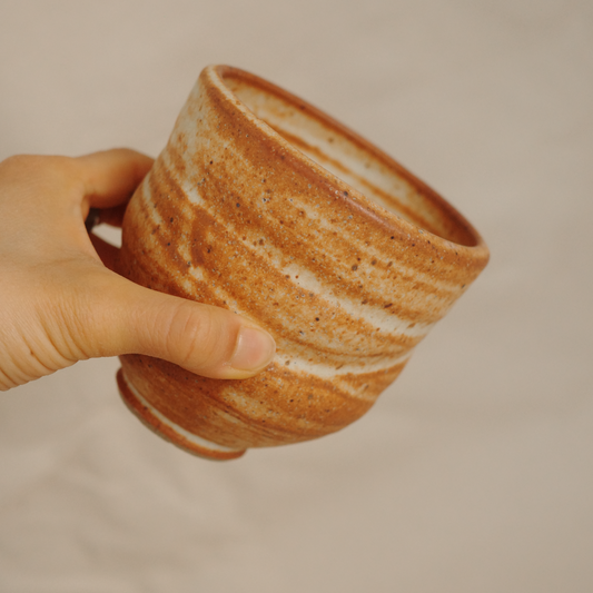 Asymmetrical toasted cup