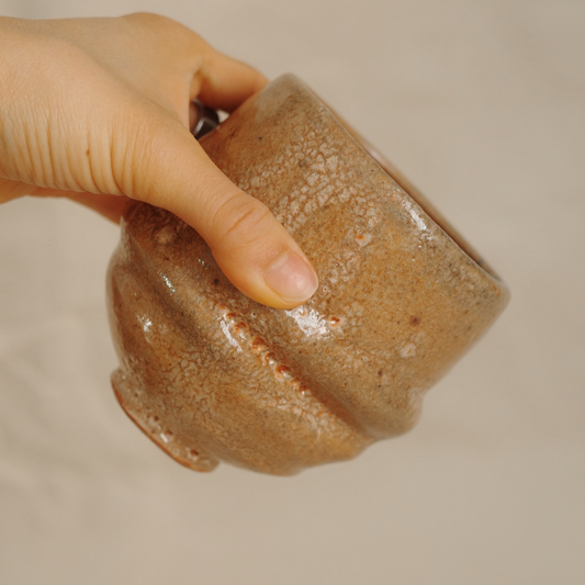 Asymmetrical toasted crawly cup